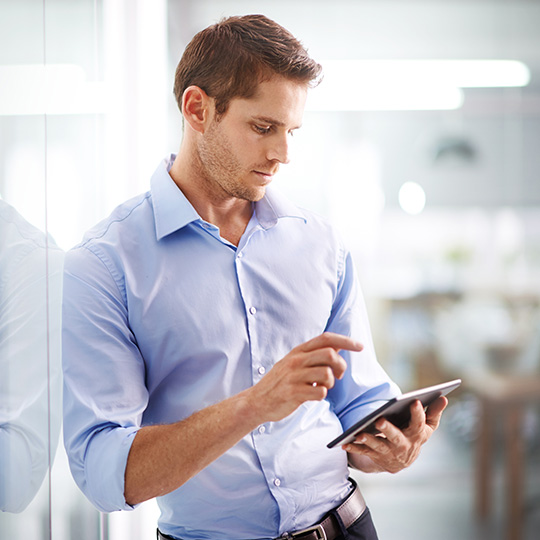 Man with a tablet.